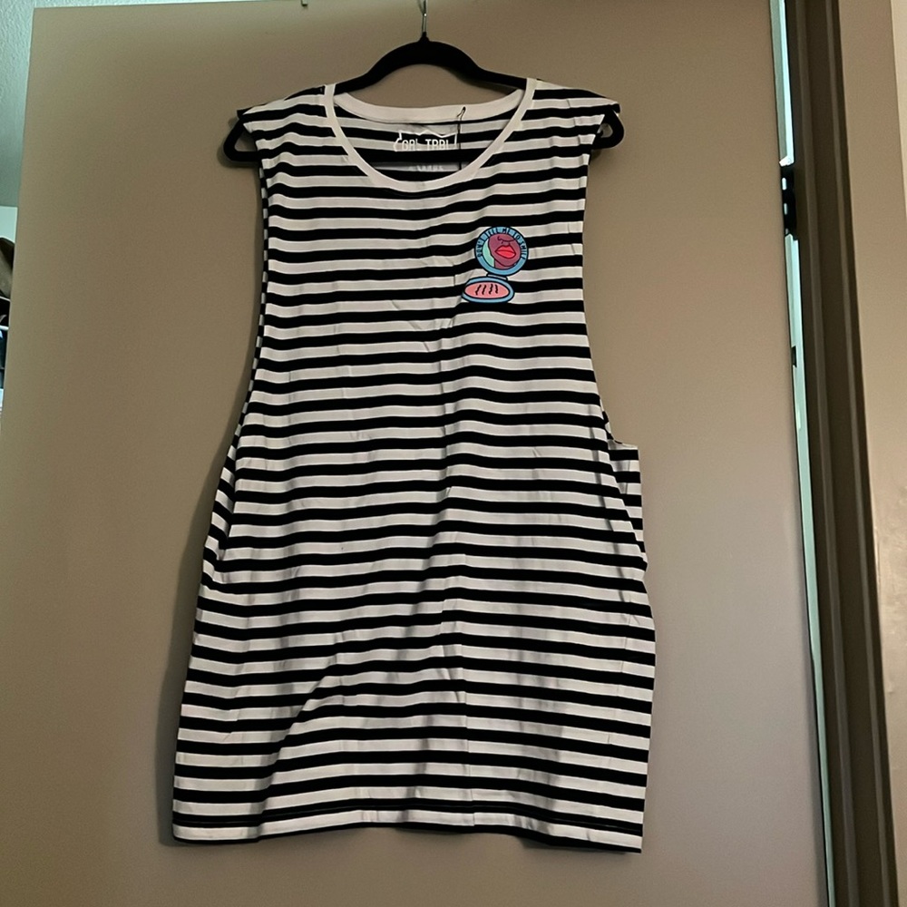 Long striped tank. Don’t tell me to smile.